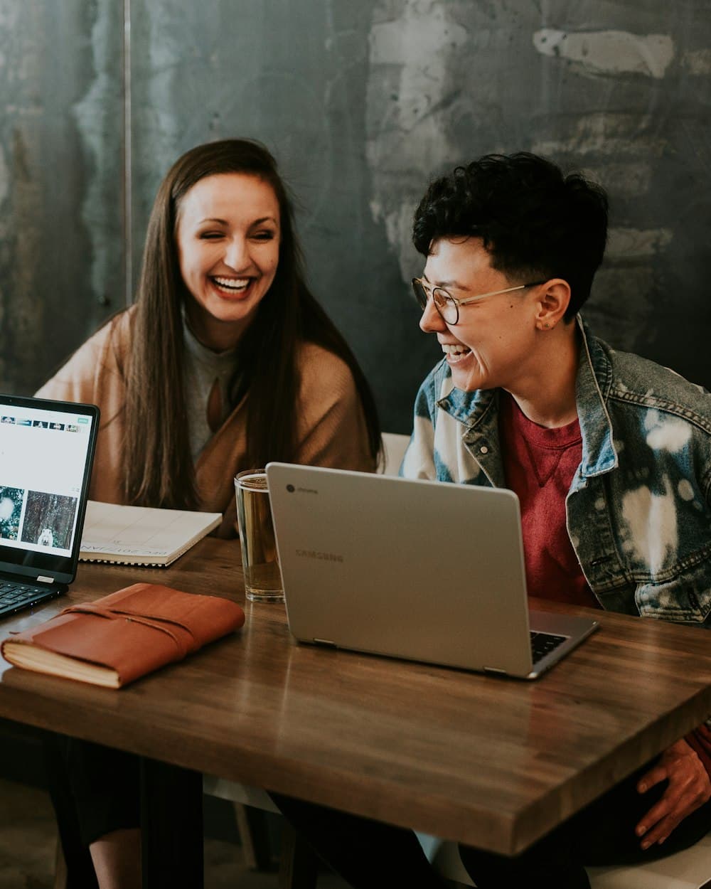 A consultant and a candidate working through a career plan together at a laptop